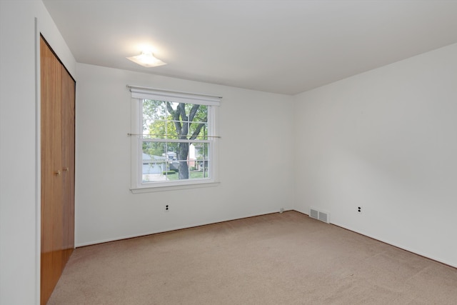 3604 Pall Dr, Warren, MI 48092 - unfurnished bedroom featuring light colored carpet and a closet