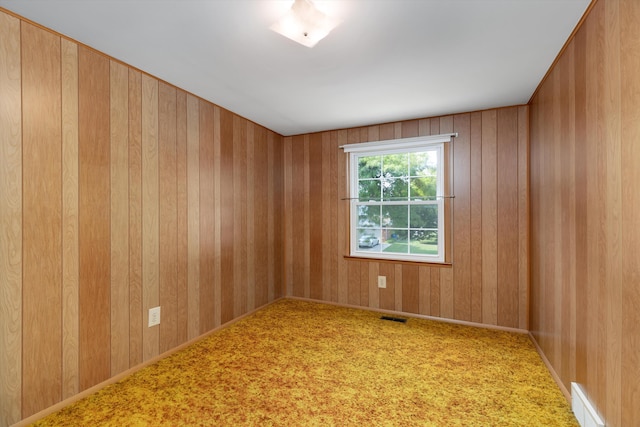 3604 Pall Dr, Warren, MI 48092 - carpeted spare room featuring wood walls