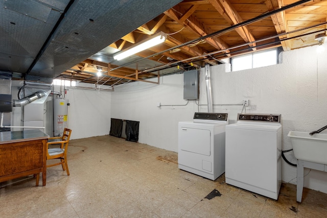 3604 Pall Dr, Warren, MI 48092 - basement with electric panel, gas water heater, light floors, and independent washer and dryer