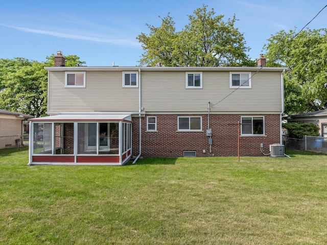 3604 Pall Dr, Warren, MI 48092 - back of property featuring a chimney, a sunroom, cooling unit, and brick siding