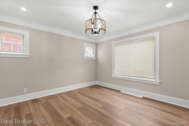 16810 Archdale St, Detroit, MI 48235 - empty room with a chandelier, baseboards, wood finished floors, recessed lighting, and ornamental molding