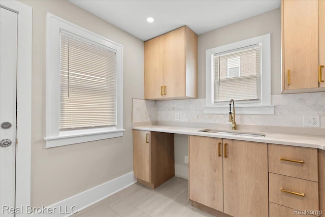 16810 Archdale St, Detroit, MI 48235 - kitchen with a sink, light brown cabinetry, decorative backsplash, light countertops, and recessed lighting