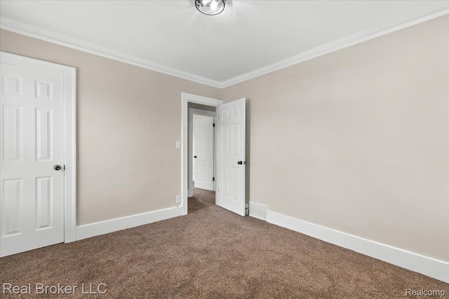 16810 Archdale St, Detroit, MI 48235 - unfurnished bedroom with dark carpet, ornamental molding, and baseboards
