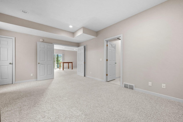 6286 Red Fox Run, Traverse City, MI 49686 - unfurnished bedroom featuring recessed lighting, light carpet, and baseboards