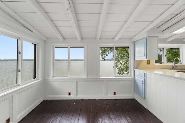1931 Charlotte Landing Rd, Springport, MI 49284 - unfurnished sunroom with beam ceiling, a water view, healthy amount of natural light, and a sink