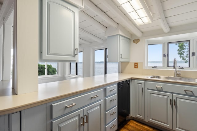 1931 Charlotte Landing Rd, Springport, MI 49284 - kitchen with a sink, gray cabinets, beam ceiling, light countertops, and dishwasher