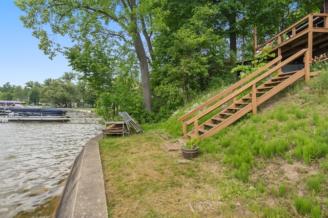 1931 Charlotte Landing Rd, Springport, MI 49284 - view of yard with stairway, a water view, and a dock