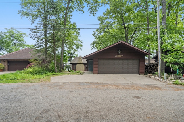 1931 Charlotte Landing Rd, Springport, MI 49284 - view of front of property with a garage and an outbuilding