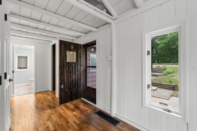 1931 Charlotte Landing Rd, Springport, MI 49284 - entrance foyer featuring wood-type flooring, healthy amount of natural light, and beamed ceiling