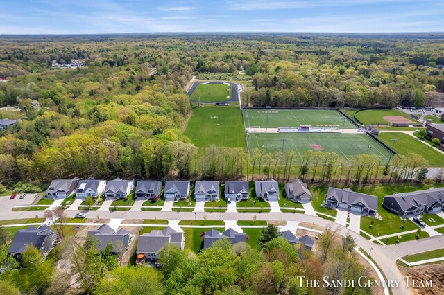 16371 Wickshire Pl, Spring Lake, MI 49456 - aerial view of property and surrounding area with a forest and nearby suburban area