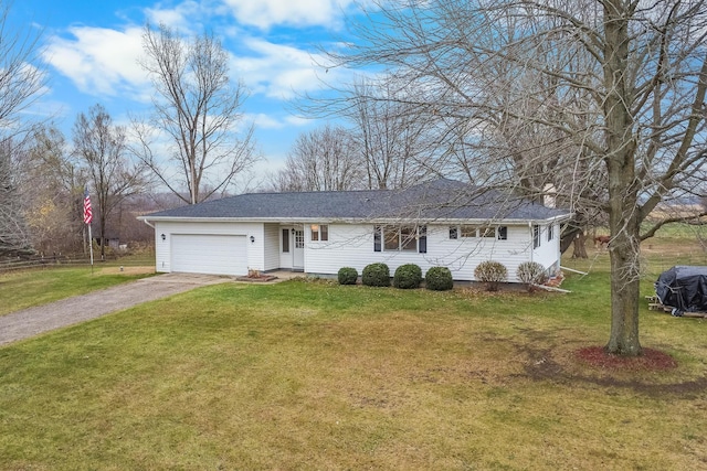 13405 Ellis Rd, Conklin, MI 49403 - single story home with an attached garage, asphalt driveway, a front lawn, and roof with shingles
