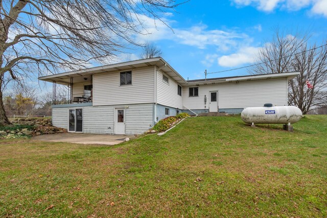 13405 Ellis Rd, Conklin, MI 49403 - back of house with a patio, a yard, and a balcony