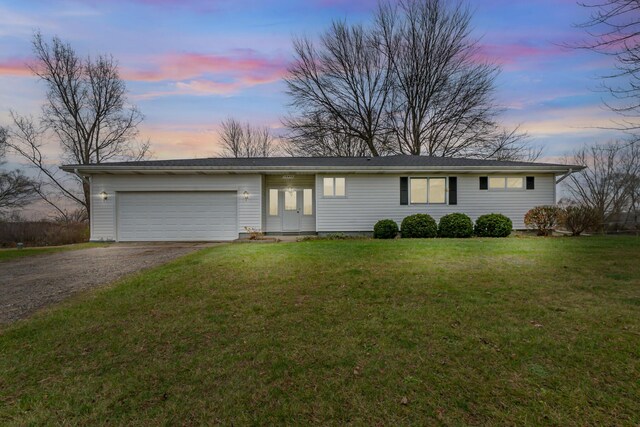 13405 Ellis Rd, Conklin, MI 49403 - single story home featuring dirt driveway, a garage, and a front yard