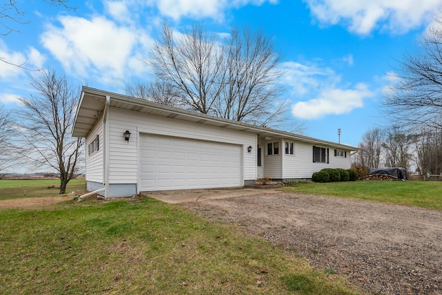 13405 Ellis Rd, Conklin, MI 49403 - single story home featuring driveway, an attached garage, and a front lawn