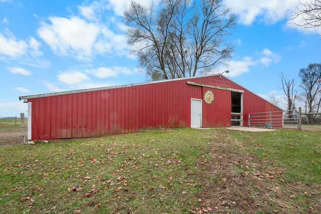 13405 Ellis Rd, Conklin, MI 49403 - view of pole building with a yard