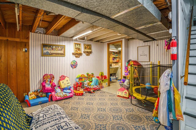 740 Halena St NE, Grand Rapids, MI 49505 - game room featuring wooden walls
