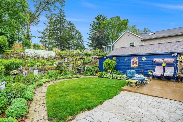 740 Halena St NE, Grand Rapids, MI 49505 - view of yard with a wooden deck