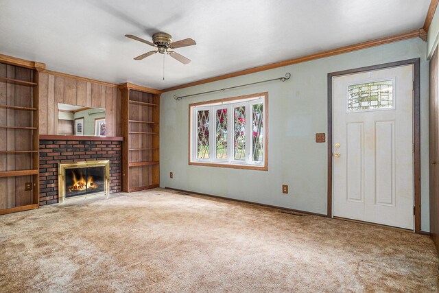 18930 G Dr N, Marshall, MI 49068 - unfurnished living room with ornamental molding, healthy amount of natural light, a ceiling fan, carpet floors, and a fireplace