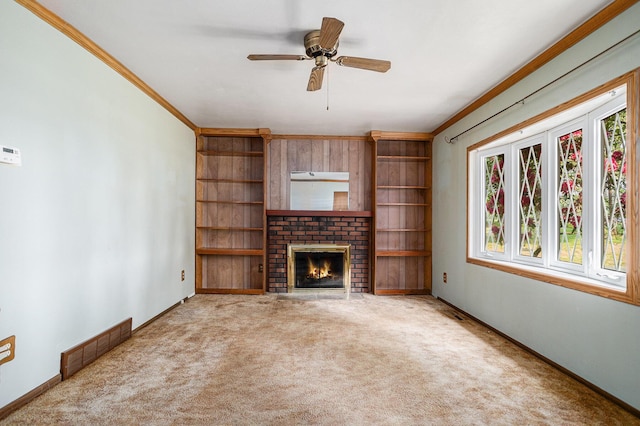18930 G Dr N, Marshall, MI 49068 - unfurnished living room with a fireplace, carpet floors, a ceiling fan, ornamental molding, and baseboards