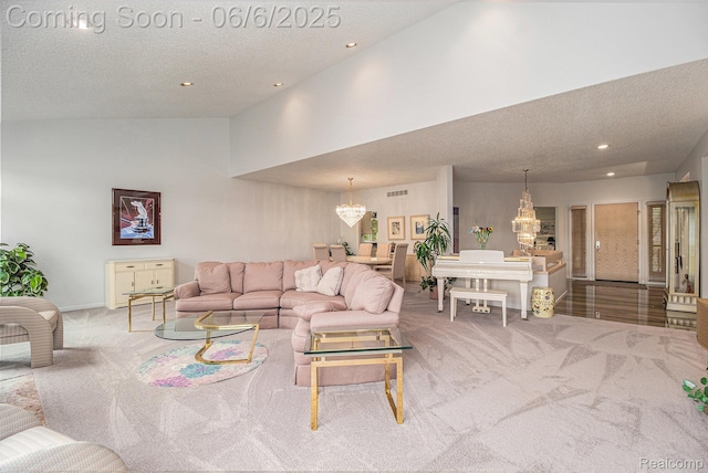 4825 Mirror Lake Dr, West Bloomfield, MI 48323 - carpeted living room with a chandelier, a textured ceiling, recessed lighting, lofted ceiling, and baseboards