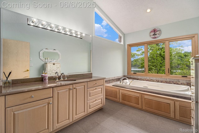 4825 Mirror Lake Dr, West Bloomfield, MI 48323 - bathroom featuring vanity, a bath, tile patterned floors, lofted ceiling, and a textured ceiling