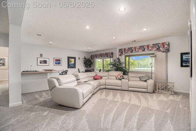 4825 Mirror Lake Dr, West Bloomfield, MI 48323 - carpeted living room featuring a textured ceiling, recessed lighting, and baseboards