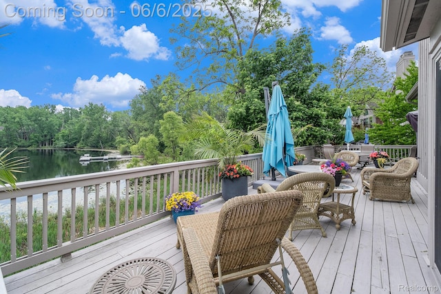 4825 Mirror Lake Dr, West Bloomfield, MI 48323 - wooden terrace featuring outdoor dining area and a water view