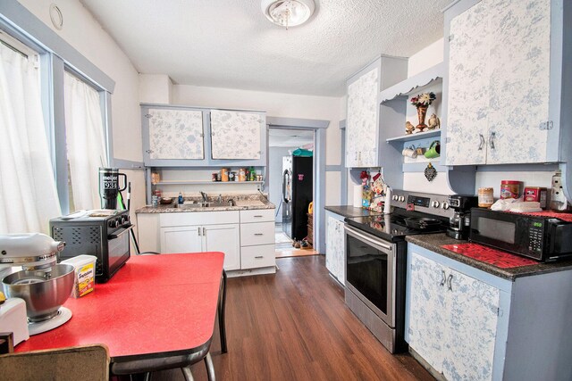 1527 Madison St, Muskegon, MI 49442 - kitchen with black appliances, open shelves, dark wood-type flooring, white cabinetry, and a textured ceiling