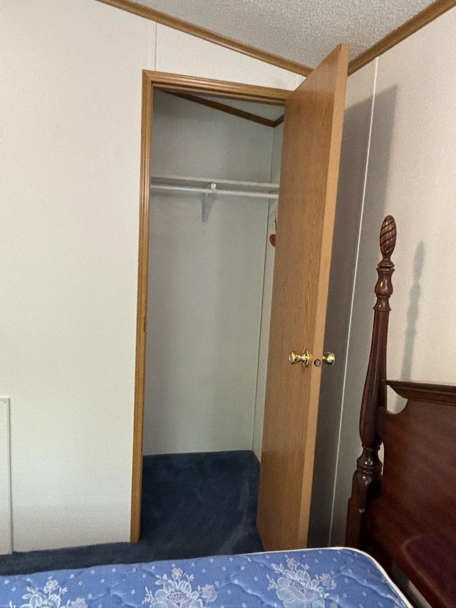 530 N June Dr, Mears, MI 49436 - carpeted bedroom with ornamental molding