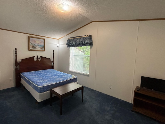 530 N June Dr, Mears, MI 49436 - bedroom with a textured ceiling, lofted ceiling, carpet, and crown molding