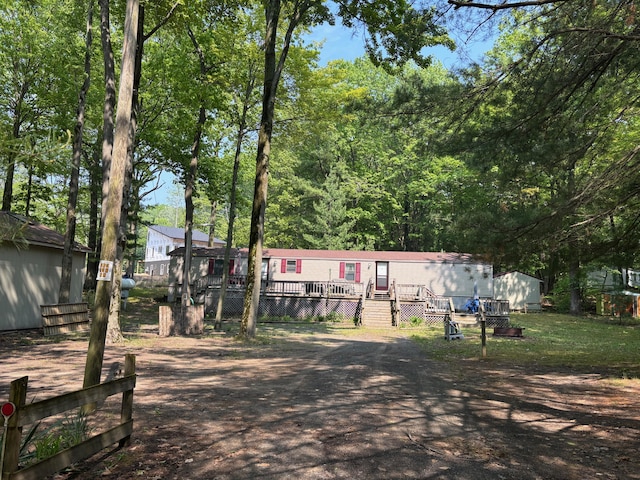 530 N June Dr, Mears, MI 49436 - exterior space with a deck