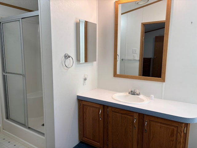530 N June Dr, Mears, MI 49436 - full bath featuring a stall shower and vanity