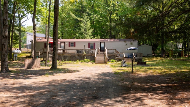 530 N June Dr, Mears, MI 49436 - manufactured / mobile home with a wooden deck