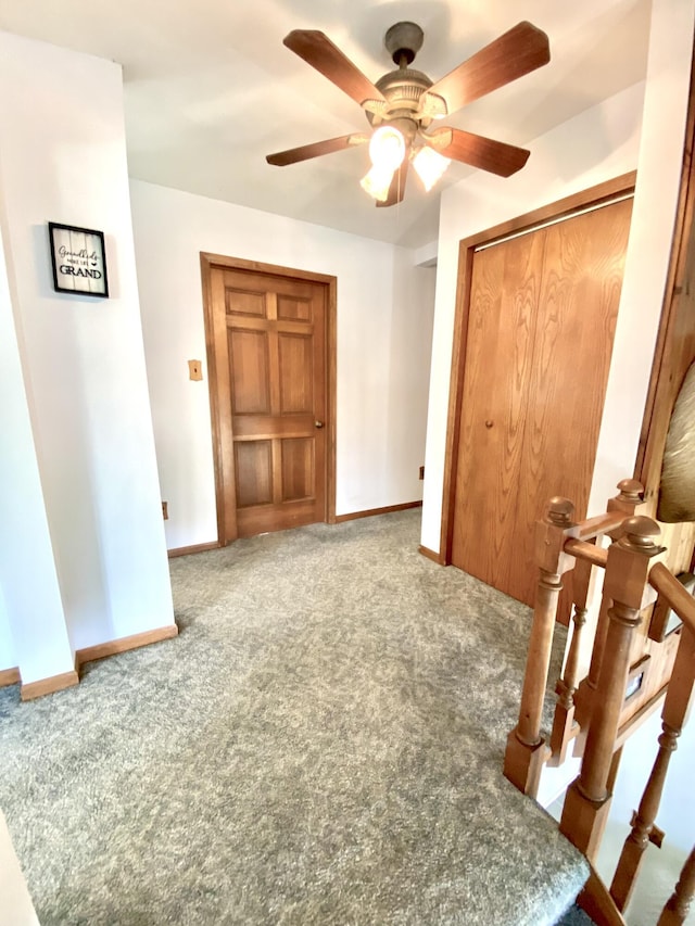 3561 Barber Rd, Hastings, MI 49058 - carpeted bedroom with baseboards, a closet, and ceiling fan