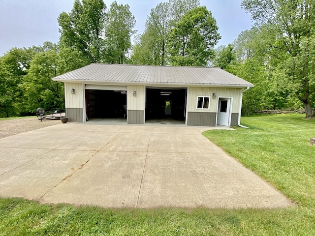 3561 Barber Rd, Hastings, MI 49058 - detached garage with view of wooded area