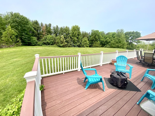 3561 Barber Rd, Hastings, MI 49058 - deck with a fire pit and a lawn