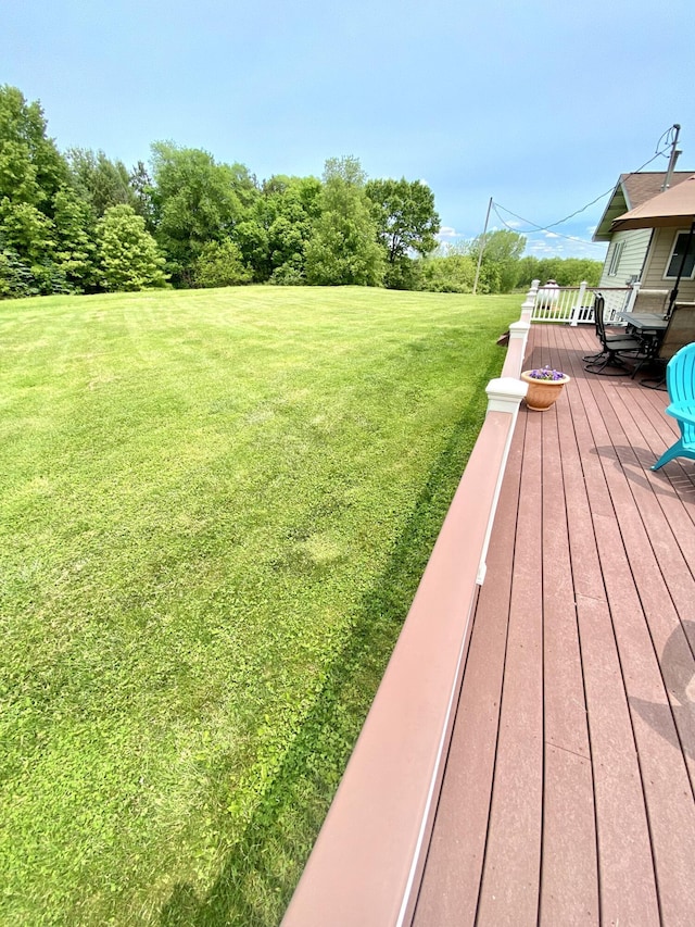 3561 Barber Rd, Hastings, MI 49058 - view of grassy yard featuring a deck