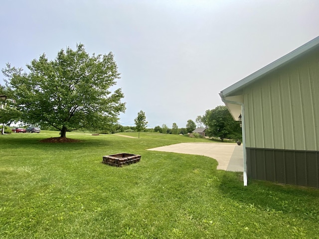 3561 Barber Rd, Hastings, MI 49058 - view of green lawn with an outdoor fire pit
