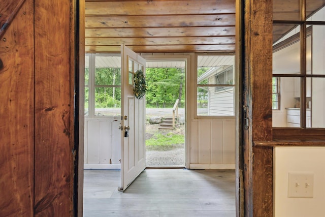 6780 Packer Dr NE, Belmont, MI 49306 - entryway featuring wood finished floors