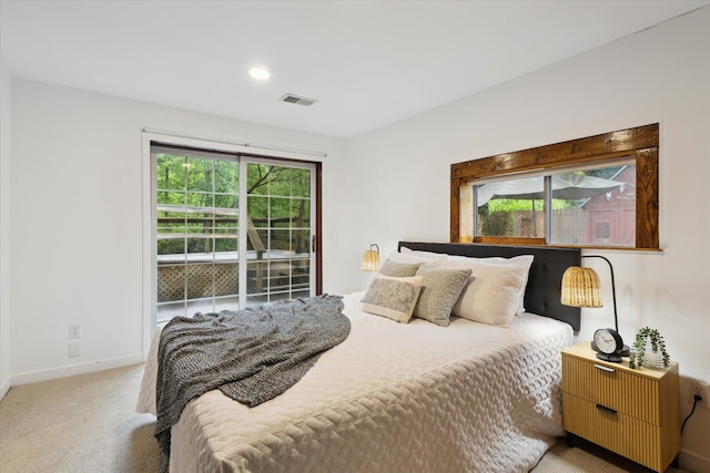 6780 Packer Dr NE, Belmont, MI 49306 - bedroom with multiple windows, light carpet, and baseboards