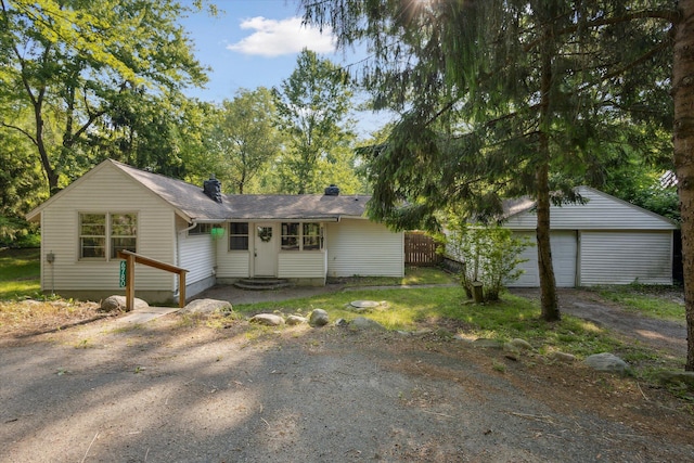 6780 Packer Dr NE, Belmont, MI 49306 - view of front of property with a chimney and roof with shingles