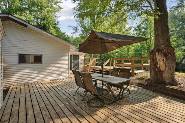 6780 Packer Dr NE, Belmont, MI 49306 - deck featuring outdoor dining area