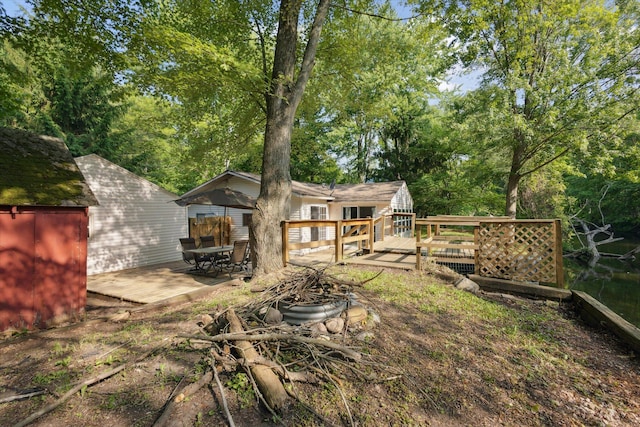 6780 Packer Dr NE, Belmont, MI 49306 - view of yard with a wooden deck