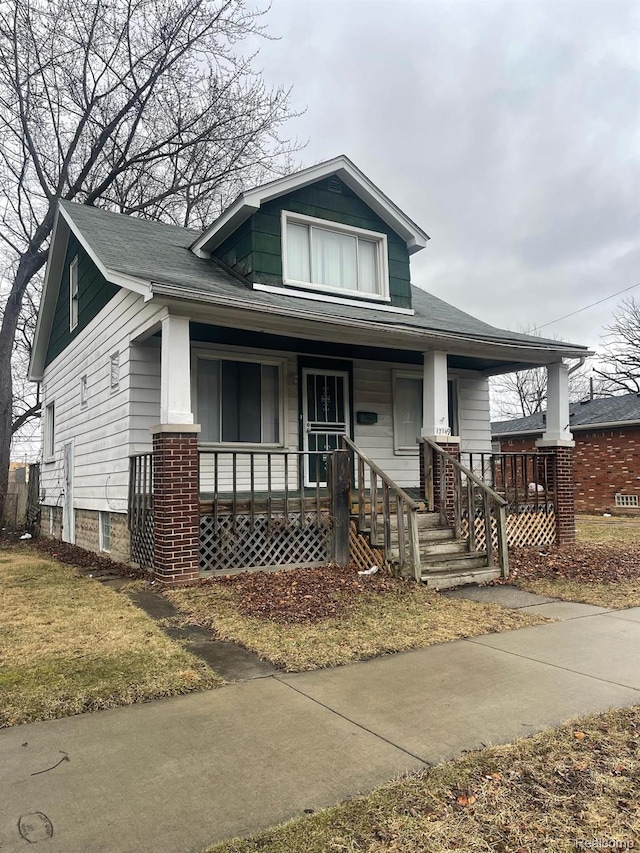 17149 New York St, Detroit, MI 48224 - view of front of home featuring covered porch