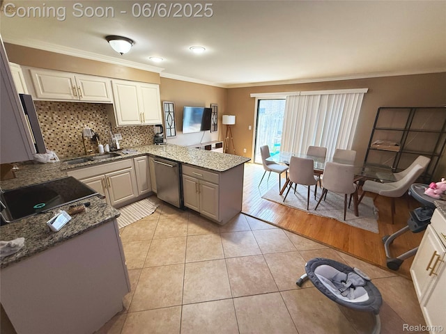 38128 Jamestown Dr, Sterling Heights, MI 48312 - kitchen featuring stainless steel dishwasher, crown molding, a peninsula, a sink, and light tile patterned floors