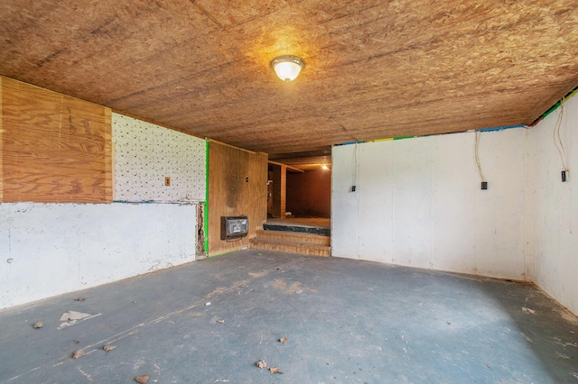 66546 Birch Rd, Jones, MI 49061 - unfurnished room featuring heating unit and concrete floors