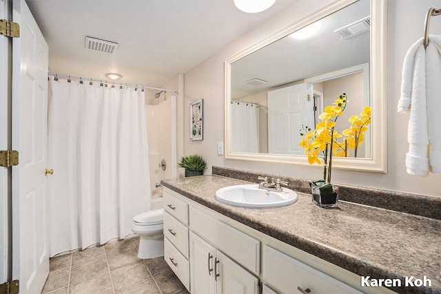 240 Pettis Ave NE, Ada, MI 49301 - bathroom with vanity, toilet, shower / bathtub combination with curtain, and tile patterned flooring