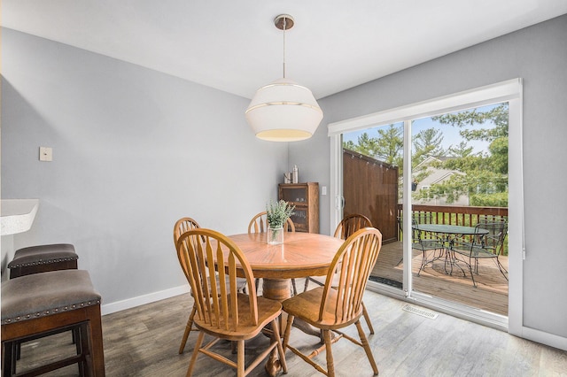 5923 E Lyn Haven Dr SE Unit 45, Grand Rapids, MI 49512 - dining space with wood finished floors and baseboards