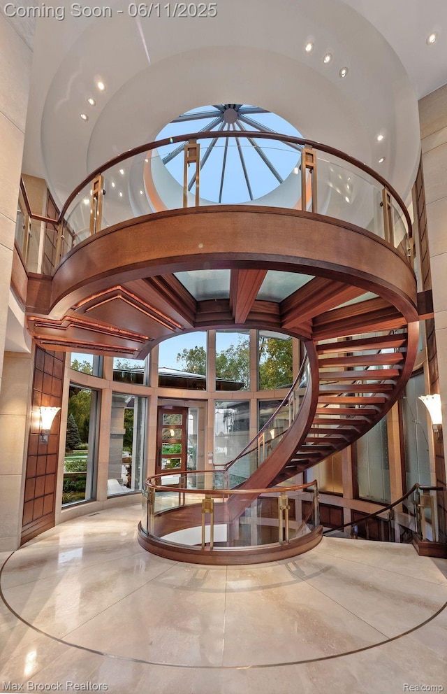 4790 Dow Ridge Rd, Orchard Lake, MI 48324 - surrounding community with recessed lighting, a high ceiling, and stairway