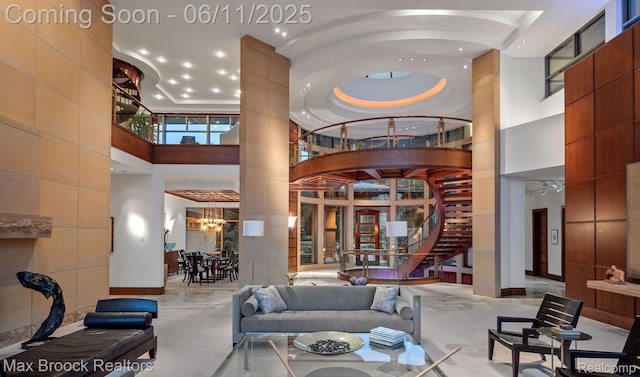 4790 Dow Ridge Rd, Orchard Lake, MI 48324 - common area with a high ceiling, recessed lighting, and stairs